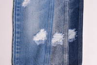 Chine Usine En Gros Écologique Sergé Denim Tissu Lourd Indigo Déchiré et Lavé À L'eau Extensible pour Garçons Et Filles