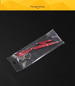 A granel Flash bomba Granada arma Airdrop caja Pan 98K AK47 pistola casco llavero - Product Image 5