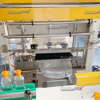 Machine d'emballage automatique à manchon thermorétractable SIPUXIN pour l'emballage rétractable de bouteilles cosmétiques et de cartons