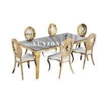 Ensemble de table à manger moderne en marbre Yunzhang 6 places avec acier inoxydable et verre pour hôtels et événements