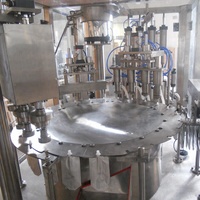 Ligne de production entièrement automatique Machine de remplissage et de vissage de bouchon de crème de jus d'huile de gelée de lait de soja de poche debout