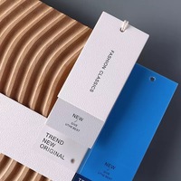 Étiquettes de vêtements en papier écologiques personnalisées à prix abordable, très demandées, pour sacs, chaussures, impression de logo de marque, estampage à chaud