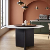 Table à manger ronde moderne de luxe pour les réunions de famille, avec plateau en marbre et base sur piédestal