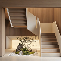Escalier moderne en U à double volée avec marches en bois massif et éclairage LED dissimulé pour intérieur de villa