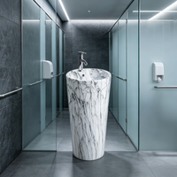 Lavabo sur pied moderne à motif marbre blanc, gris, noir pour salle de bain d'hôtel