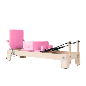 Professional Commercial Studio Equipment Sliding Bed Maple Wood Pink Pilates Reformer