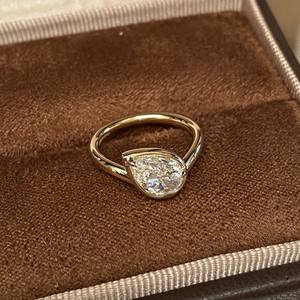 プロ仕様のカスタマイズされたIGI認定CVDラボグロウンダイヤモンド婚約指輪 1カラット VVS 14K/18K純金ペアカット クラシック女性用 - Product Image 5