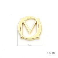 Écusson métallique rond évidé de qualité supérieure avec logo lettre en métal au design tendance pour sacs à main, portefeuilles, chapeaux, vêtements, plaque nominative, étiquette métallique avec logo