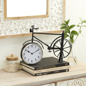 Reloj de mesa redonda chapado en oro acabado con un diseño minimalista elegante perfecto para la decoración de lujo de la sala de estar y el dormitorio - Product Image 5