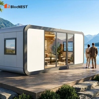 Maison conteneur modulaire de luxe personnalisable en matériaux haute résistance, bungalow clé en main avec salle de bain et cuisine