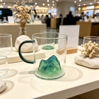 Tasse à café en verre borosilicate soufflé à la main avec base montagne verte et anse verte, idéale pour le thé et le lait, vente en gros