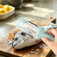 Trendy anti-spat fruit- en vis-schilmes, multifunctionele keukenhulp van plastic met opvangbak voor schilresten.