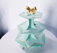 Elegante Caja de Papel Cuadrada para Cupcakes con Cristales Acuamarina y Patrón de Encaje Dorado para Decoración de Mesa de Postres en Bodas de Lujo 2026
