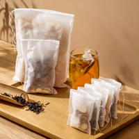 Sachets de thé biodégradables non tissés, vides, avec cordon de serrage, pour thé en vrac, herbes et café – Vente en gros directe usine