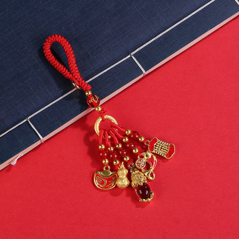Pendentif émail noeud porte-bonheur rouge