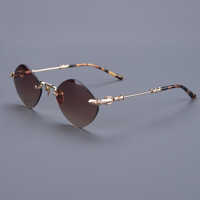 Lunettes de soleil œil-de-chat de luxe sans monture en titane, verres dégradés marron, logo personnalisé, fabricant de lunettes OEM ODM sous marque privée