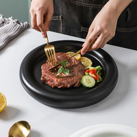 Vente en gros, assiettes épaisses de Style nordique, plat blanc noir en céramique, assiette à Steak en céramique, assiette à dîner en céramique