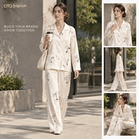 Ensemble deux pièces blanc aspect satiné pour femme, col cranté, manches longues, vêtements de détente, imprimé visage abstrait, vente en gros OEM, faible MOQ