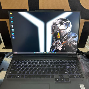 Ordinateur portable de jeu Lenovo Legion R9000P gris - AMD Ryzen 9 7945HX, 16 Go de RAM, 1 To de SSD et NVIDIA RTX 4060 pour le jeu et le multitâche - Product Image 1