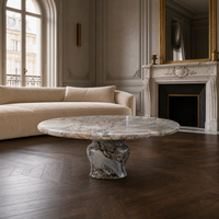 Table basse moderne en marbre rose naturel motif éléphant, avec piétement sablier cintré, table centrale en pierre pour salon, vente en gros