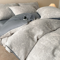 Nouveau pur coton de haute qualité à trois couches de fil teint Jacquard quatre pièces ensemble de draps de terre