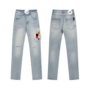 Vente en gros d'usine, logo de marque personnalisé, jeans slim fit déchirés bleus de haute qualité avec patch étoile, jeans tendance pour hommes, jeans Amiry - Product Image 1