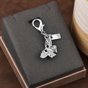 Accessoires de porte-clés au toucher premium, décorations de <span class=keywords><strong>sac</strong></span> <span class=keywords><strong>à</strong></span> <span class=keywords><strong>dos</strong></span> en forme d'ours et de papillon dorés <span class=keywords><strong>pour</strong></span> la vente en gros - Product Image 5