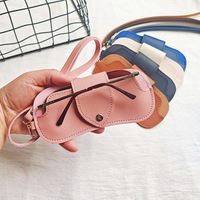 Nouvel étui à lunettes en cuir PU à suspendre au cou, motif uni tendance, parfait pour ranger différents types de lunettes