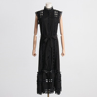 Robe midi sans manches à col montant, style français, unie, pour femme, nouvelle collection printemps 2025, design épuré, taille évidée, effet amincissant