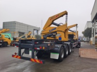 Semi-remorque Sidelifter Sino Truck robuste avec télécommande, auto-chargeante et transportant des conteneurs de 20/40 pieds, un camion de 37 tonnes