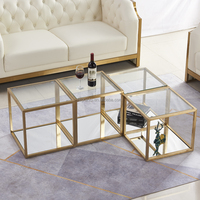 Ensemble de table basse de luxe 4 pièces en acier inoxydable doré avec plateau en verre trempé, table centrale modulable pour la maison et l'hôtel
