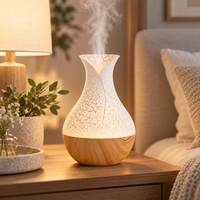 Diffuseur d'arômes et humidificateur d'air créatif en forme de vase étoilé ajouré