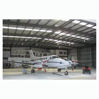 Hangar télescopique pour avions en acier industriel de haute qualité, porte coulissante, hangar pour avions, bâtiment métallique préfabriqué