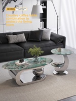 Table basse ovale en métal minimaliste moderne pour salons, nécessite l'assemblage, élégante et compacte