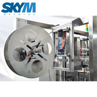 Machine d'étiquetage automatique à manchon rétractable SKYM pour bouteilles d'eau minérale et de boissons
