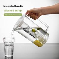 Pichet à eau en plastique transparent ergonomique à poignée intégrée, design élargi, prise en main confortable, capacité 2-3L, vente chaude