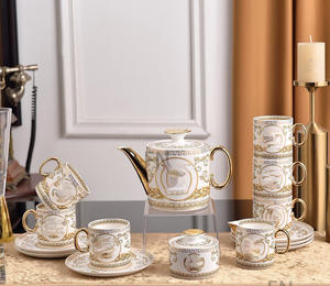 Service à café de luxe en porcelaine blanche de style européen, 15 pièces, avec bordure dorée, à prix réduit - Product Image 1