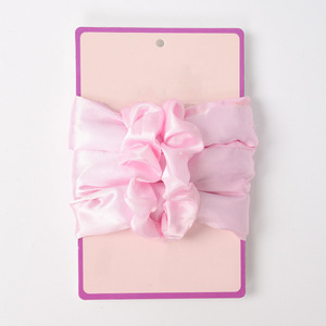 Élastique à cheveux en satin rose en forme de U pour usage quotidien - Product Image 1