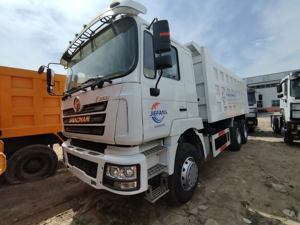 Shacman Delong รถบรรทุกไฮดรอลิกสีขาว2X8รถบรรทุกราคาถูกและมีการแข่งขัน - Product Image 2