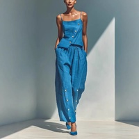 Ensemble deux pièces en lin décontracté et ample pour femme, collection été 2026, avec détails boutonnés et design créatif