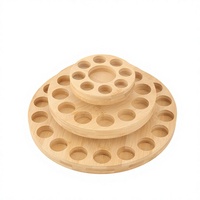 Support de présentation d'huiles essentielles en bambou à 39 compartiments 360 °   Plateau de rangement et de présentation rotatif à trois niveaux pour bouteilles