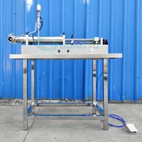 Machine de remplissage semi-automatique horizontale pour liquides, eau et crèmes