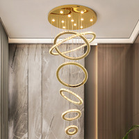 Lustre en cristal LED de luxe à anneaux, style moderne, pour décoration intérieure, hall d'hôtel, escalier, villa
