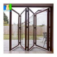 Porte pliante en aluminium et verre avec finition de surface pour balcon, hôtel et usage commercial |   Système de porte coulissante et pliante moderne