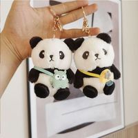 Vente en gros de jouets animaux en peluche panda mignon porte-clés en peluche doux jouets distributeur automatique de jouets mini porte-clés panda en peluche dessin animé Kawaii