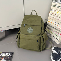 Sac à dos d'extérieur léger et tendance Nouveau sac à dos de voyage simple et polyvalent pour femmes Sac pour filles