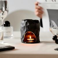 Diffuseur d'arômes en céramique noir mat de forme irrégulière, brûleur d'huiles essentielles pour cire fondue et bougies chauffe-plat