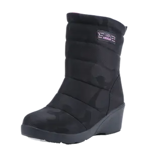 Proveedor de oro negro de alta calidad OEM impermeable piel señoras botas de nieve para las mujeres