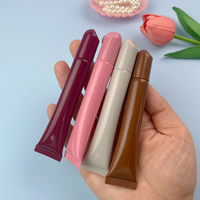 Nouvel arrivage de tube de brillant à lèvres vide rose nude marron mat baume à huile emballage de tubes de brillant à lèvres doux de marque privée