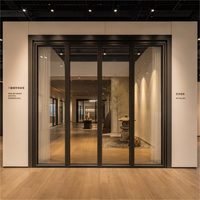 Porte pliante en alliage d'aluminium moderne résistante aux intempéries, porte vitrée à double battant, finition noire mate pour la maison, le bureau, la cuisine, la villa